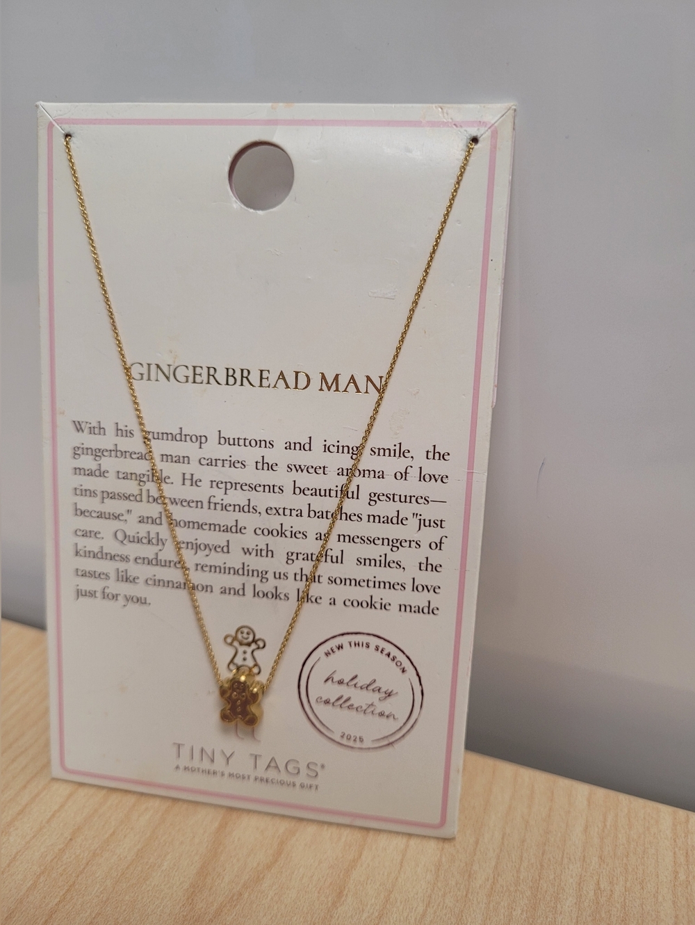 Tiny Tags brand gingerbread man pendant necklace